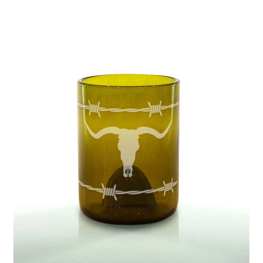 An amber-colored upcycled glass with a Barbwire pattern and an engraving of a longhorn steer's skull on the front.