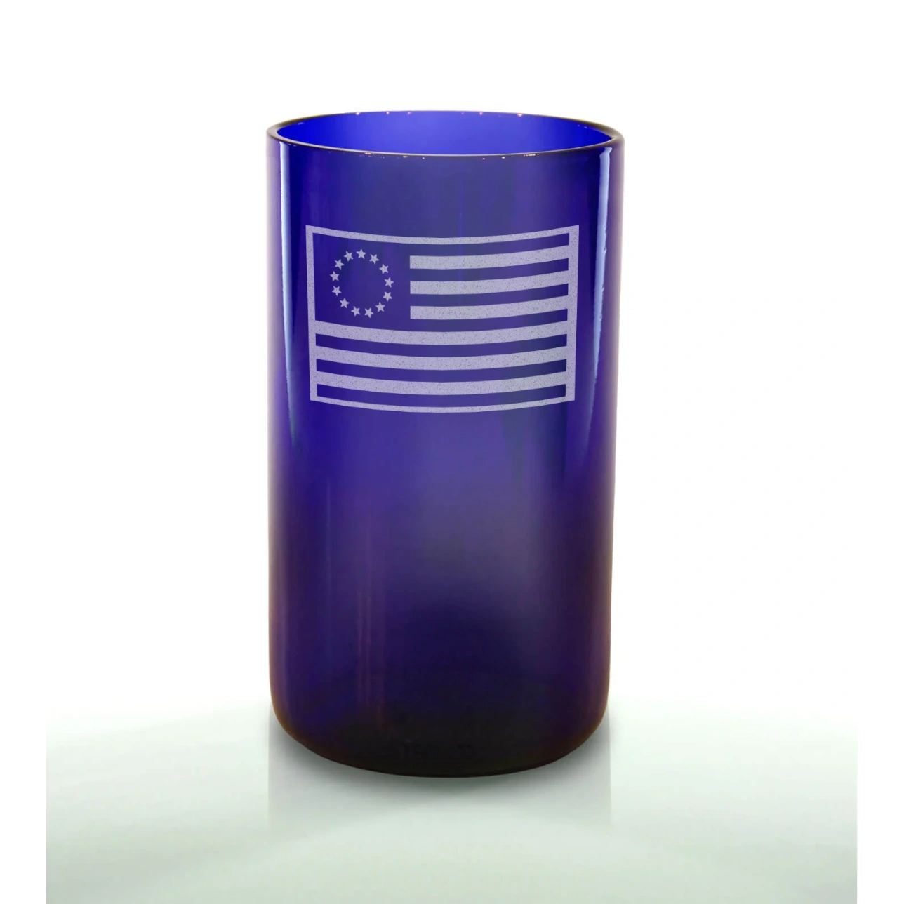 A blue glass with an engraved Betsy Ross flag design.