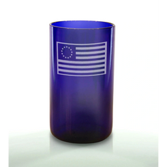 A blue glass with an engraved Betsy Ross flag design.